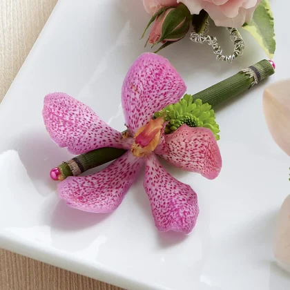 Pink Mokara Boutonniere